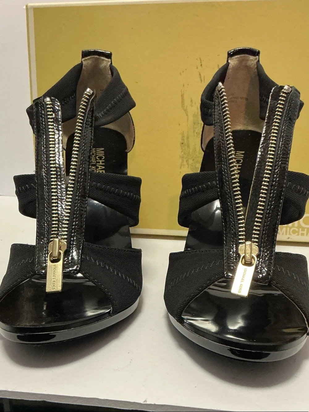 Michael Kors Black Patent and Gold Zip Front Heels